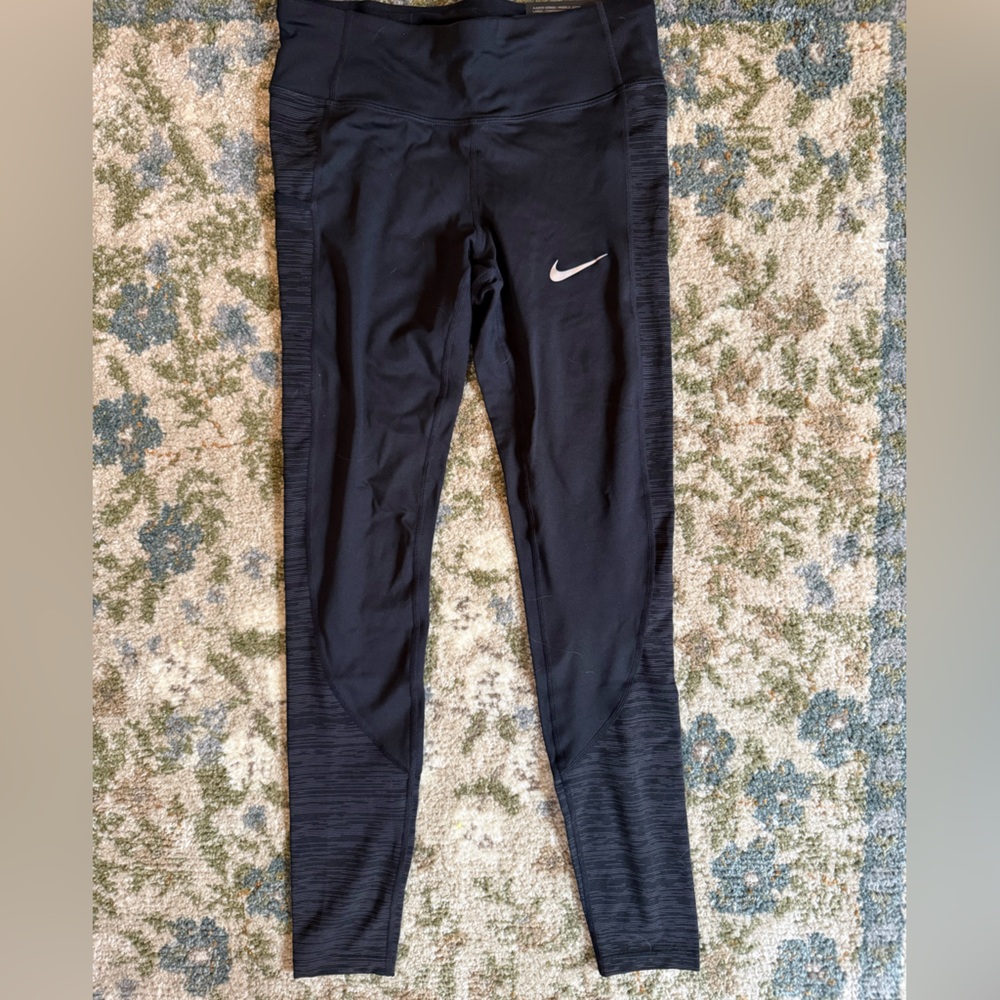 Nike Black Leggings NWT size small with Textured Side Panels